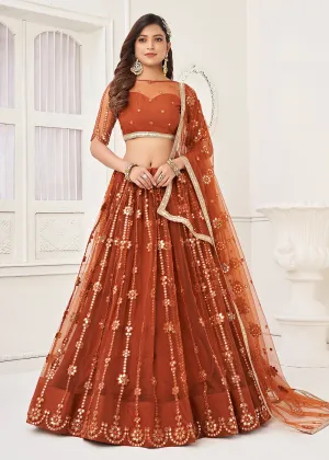 Embroidered Net Rust Sangeet & Wedding Wear Lehenga Choli